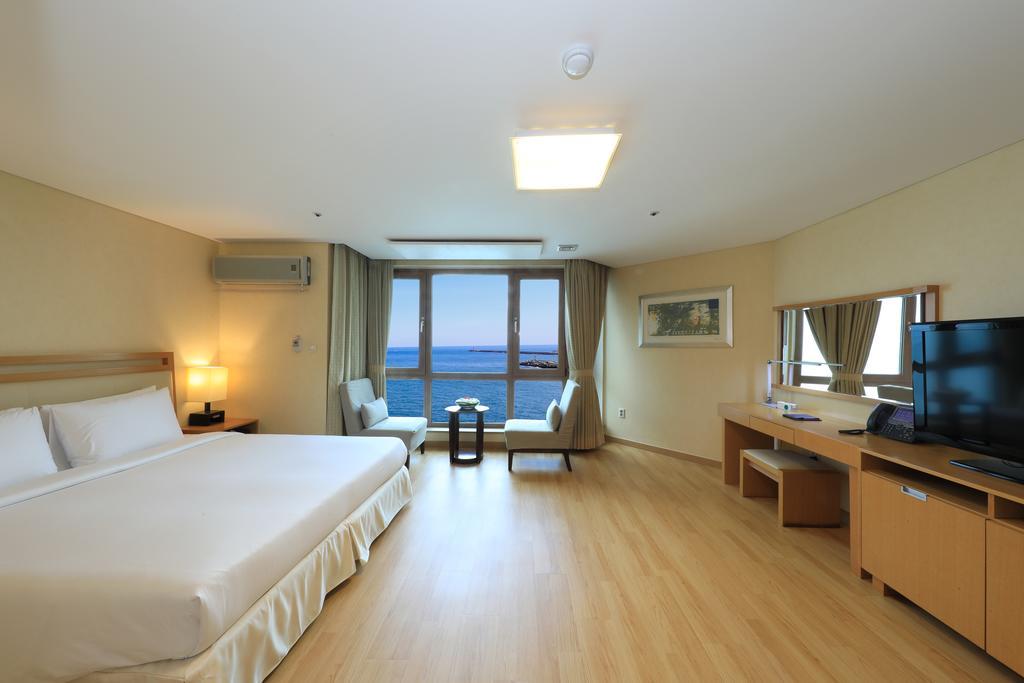 Ocean Suites Jeju Hotel Habitación foto